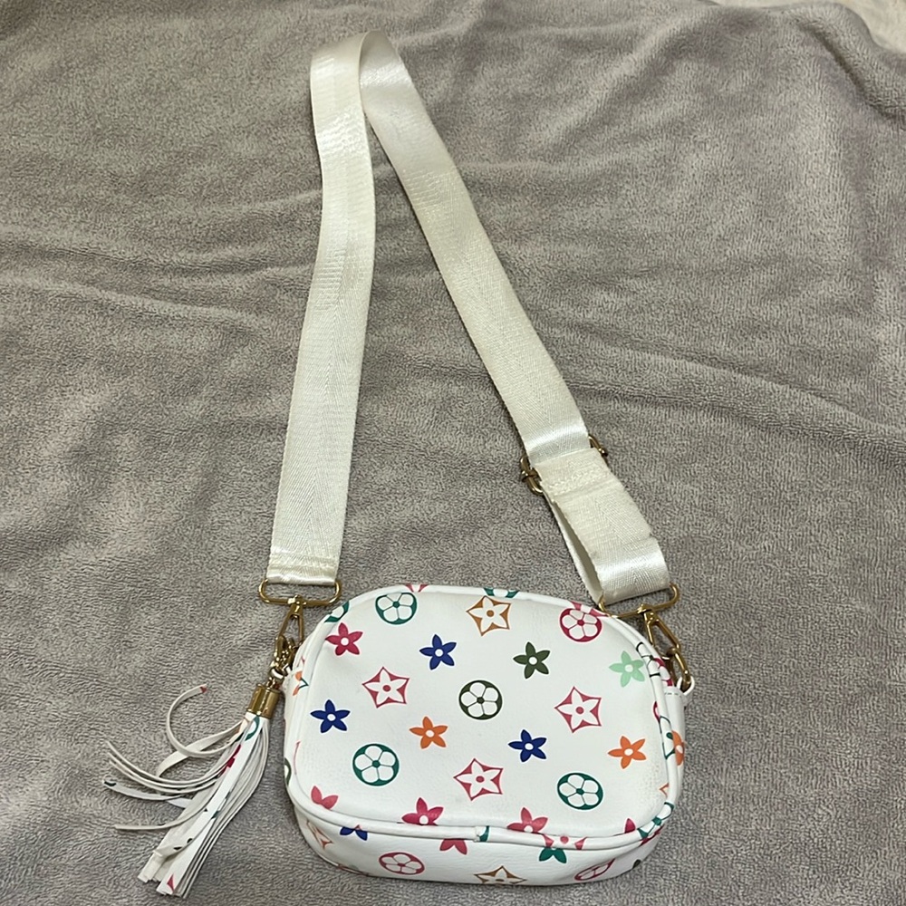 Faux LV crossbody for kids.